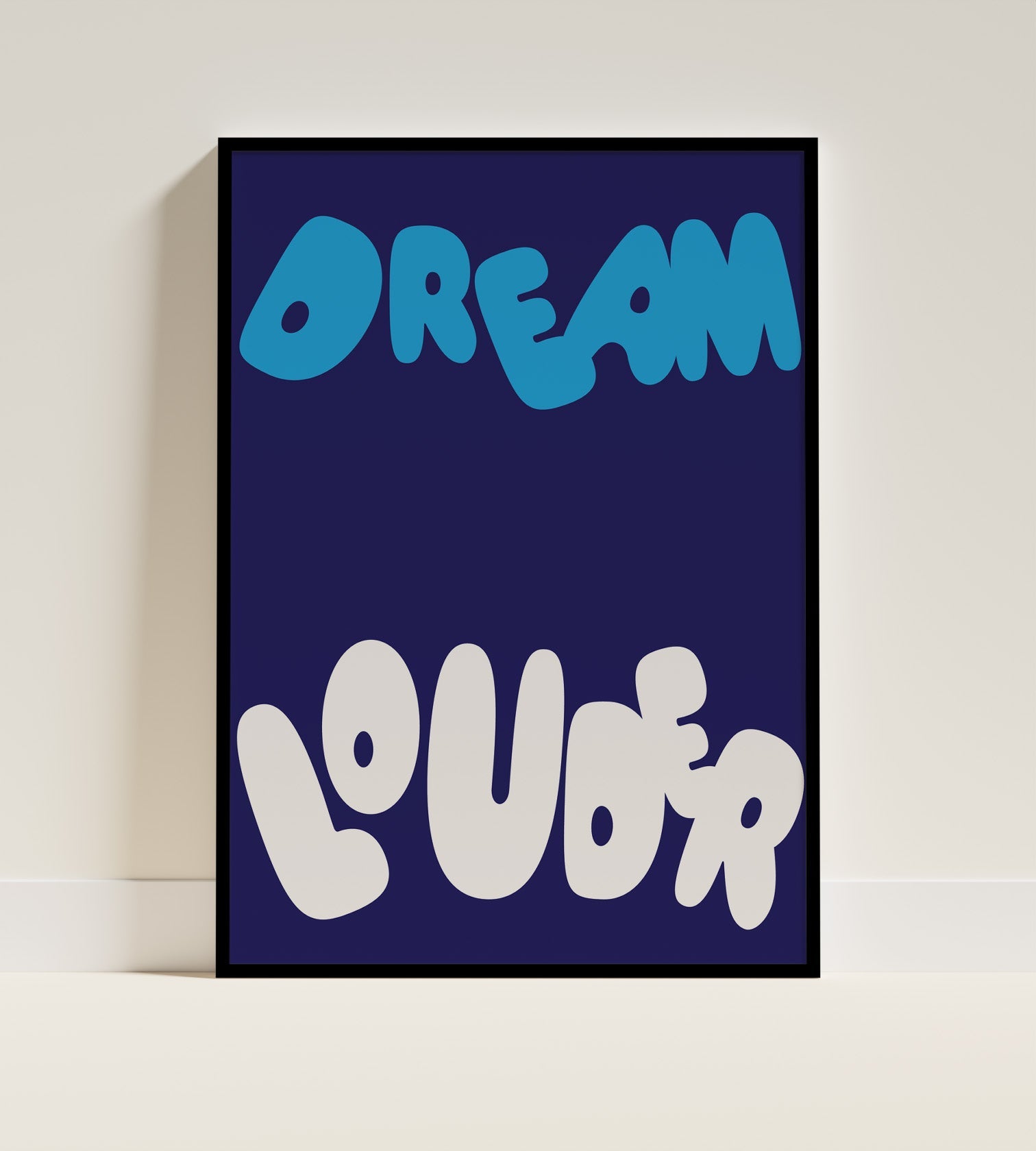 "Dream louder Poster in black frame"