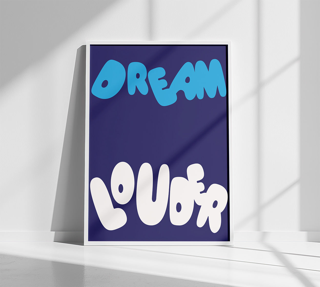 "Dream_louder_Poster_in_white_frame"