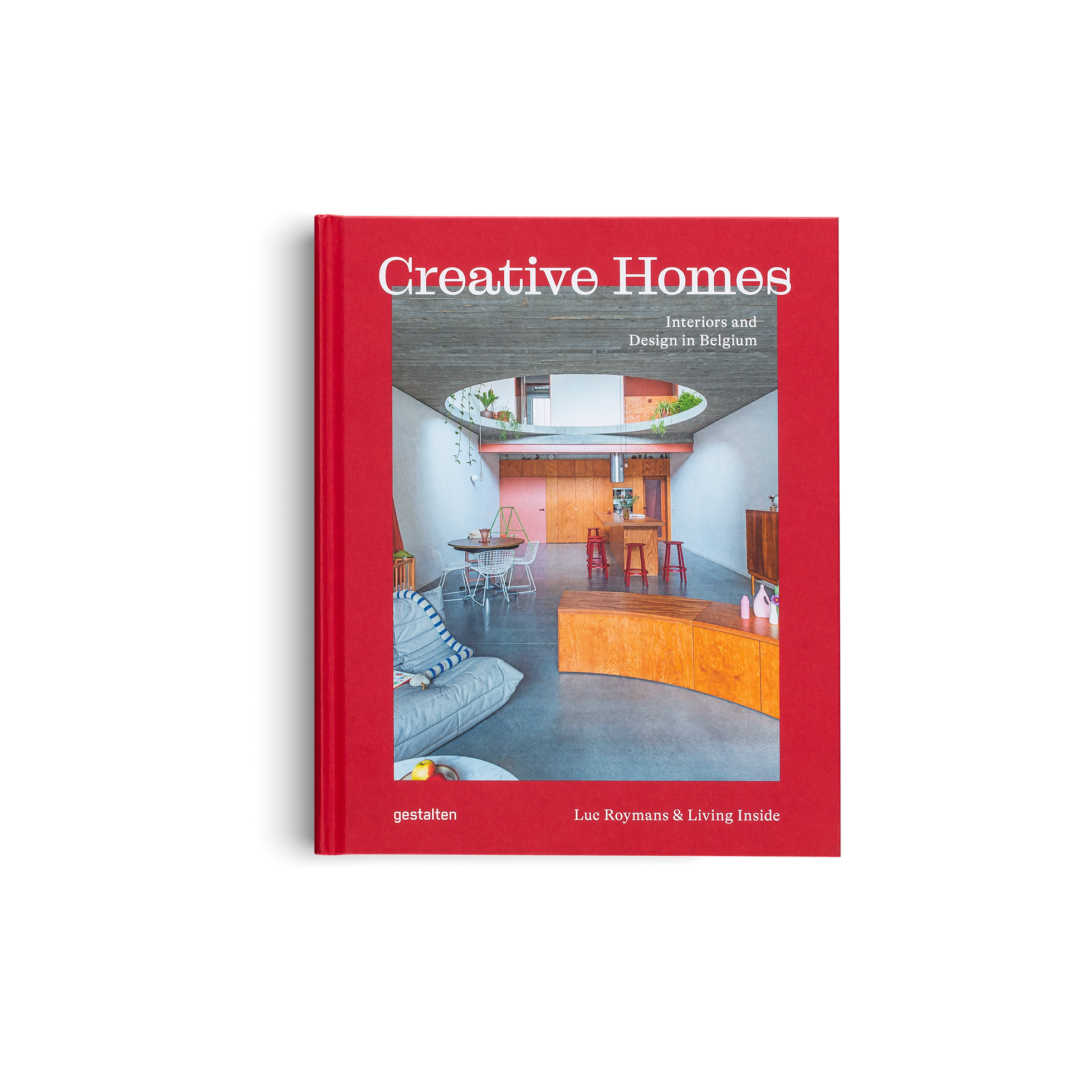 "Book titled 'Creative Homes' with a red cover featuring an interior design image."