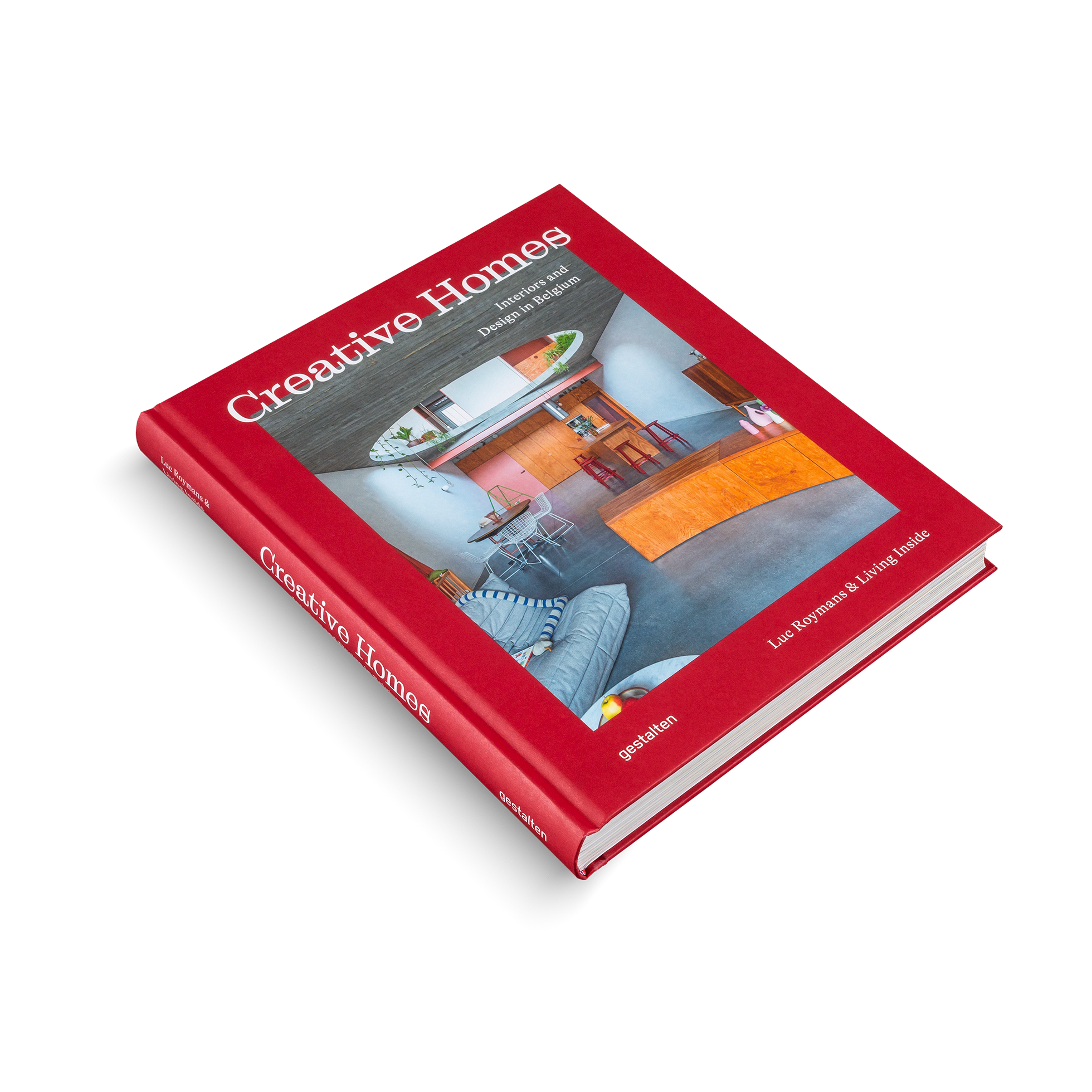"Red book titled 'Creative Homes' on a white background"