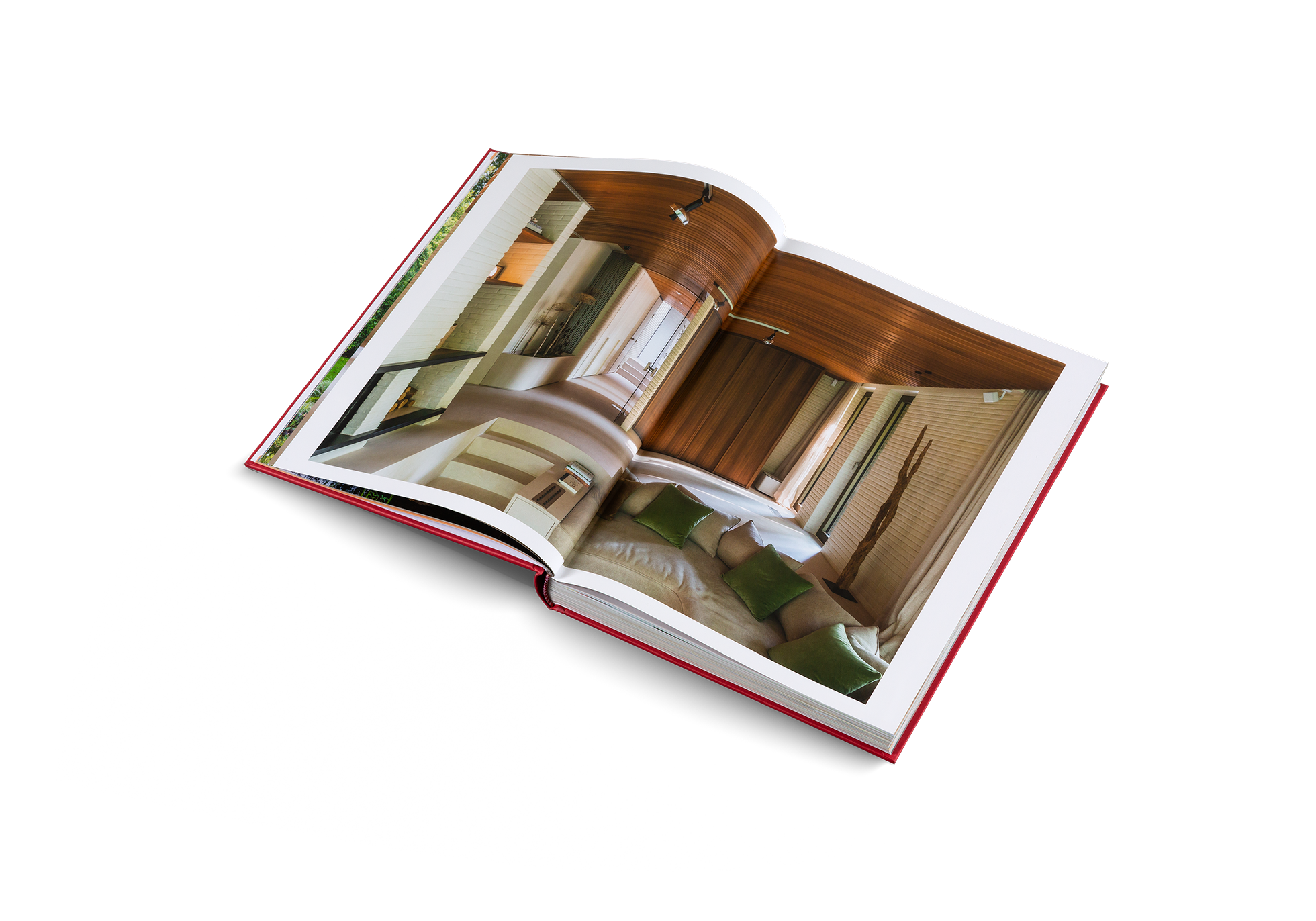 "Open book showing interior design images on a white background"