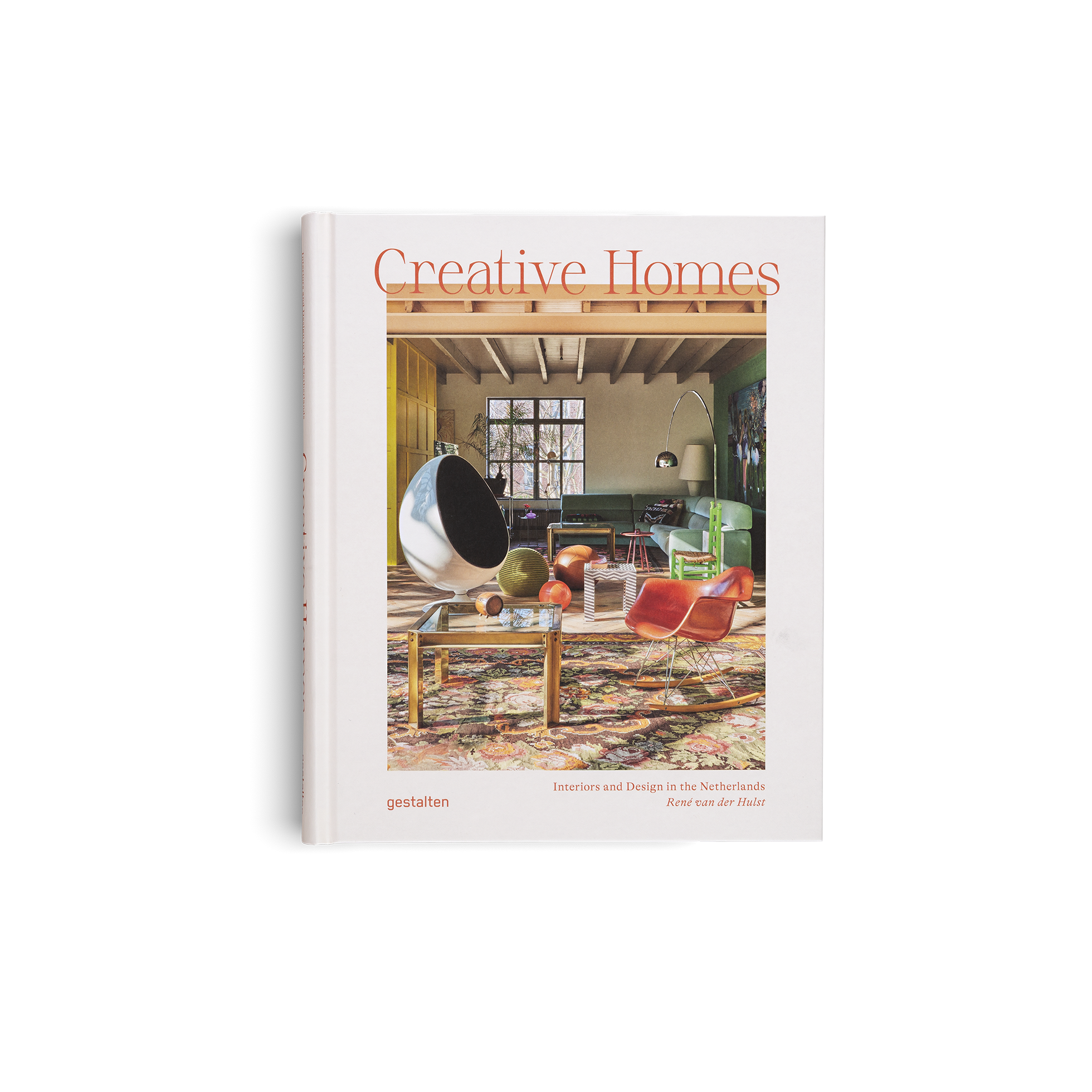 "Book titled 'Creative Homes' with an interior design image on the cover."