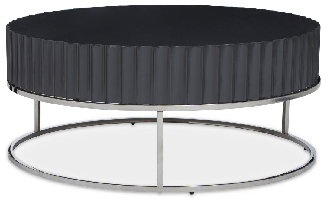 "Round Black coffee table on stainless steel  base on white background"