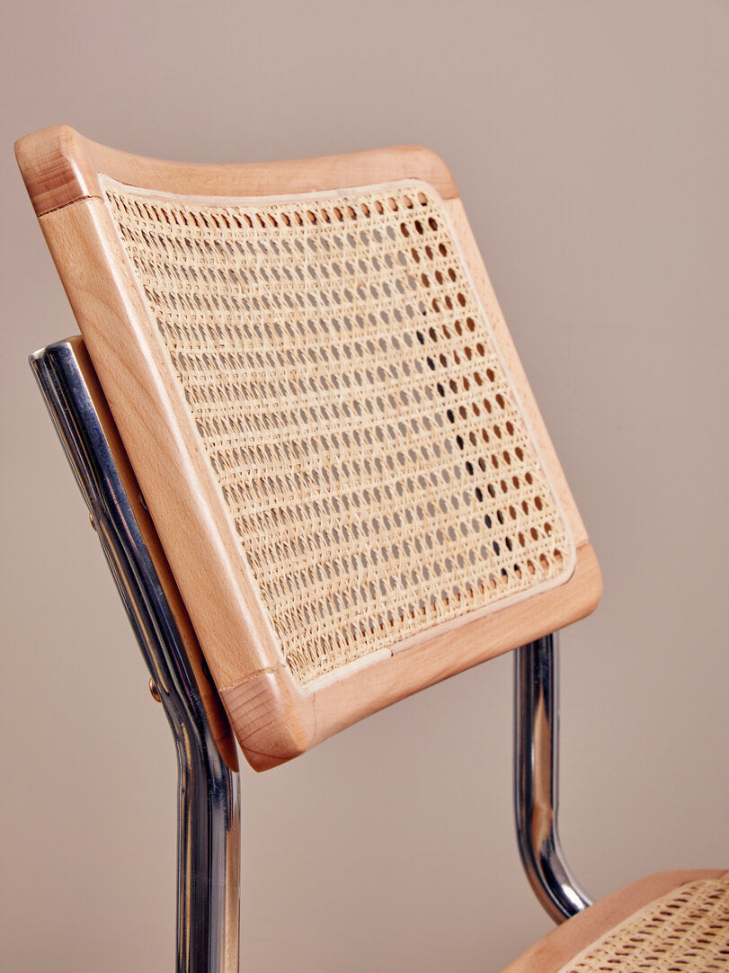 DESSAU Bauhaus-inspired rattan and tubular steel cantilever dining chair KEFINO