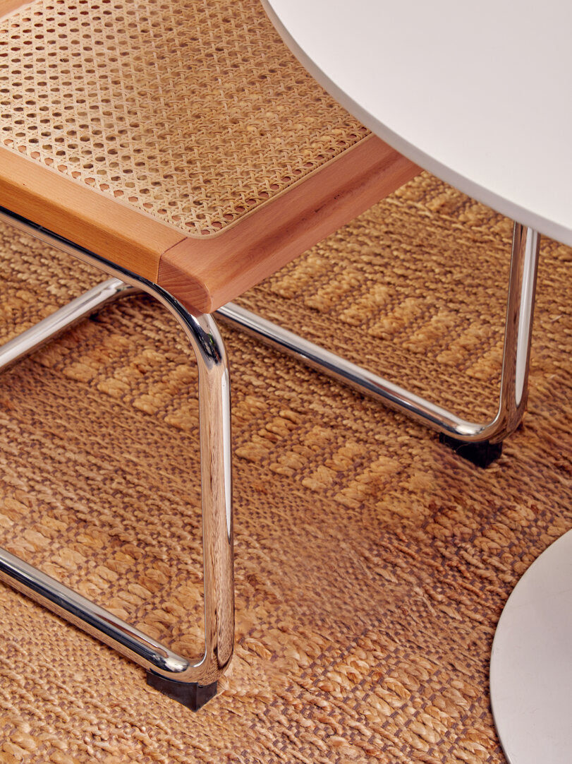 DESSAU Bauhaus-inspired rattan and tubular steel cantilever dining chair KEFINO