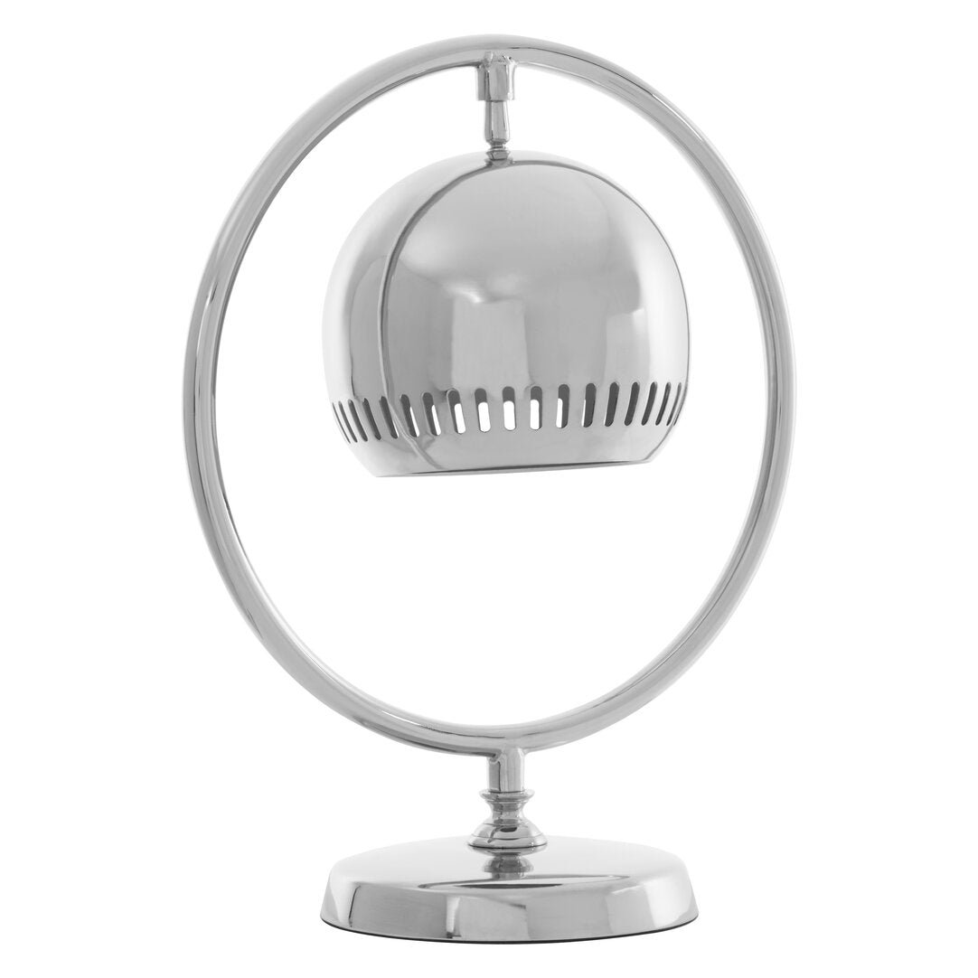 "Chrome table lamp with a round shade on a white background"
