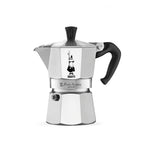 "Stainless steel espresso maker with black handle on a white background"