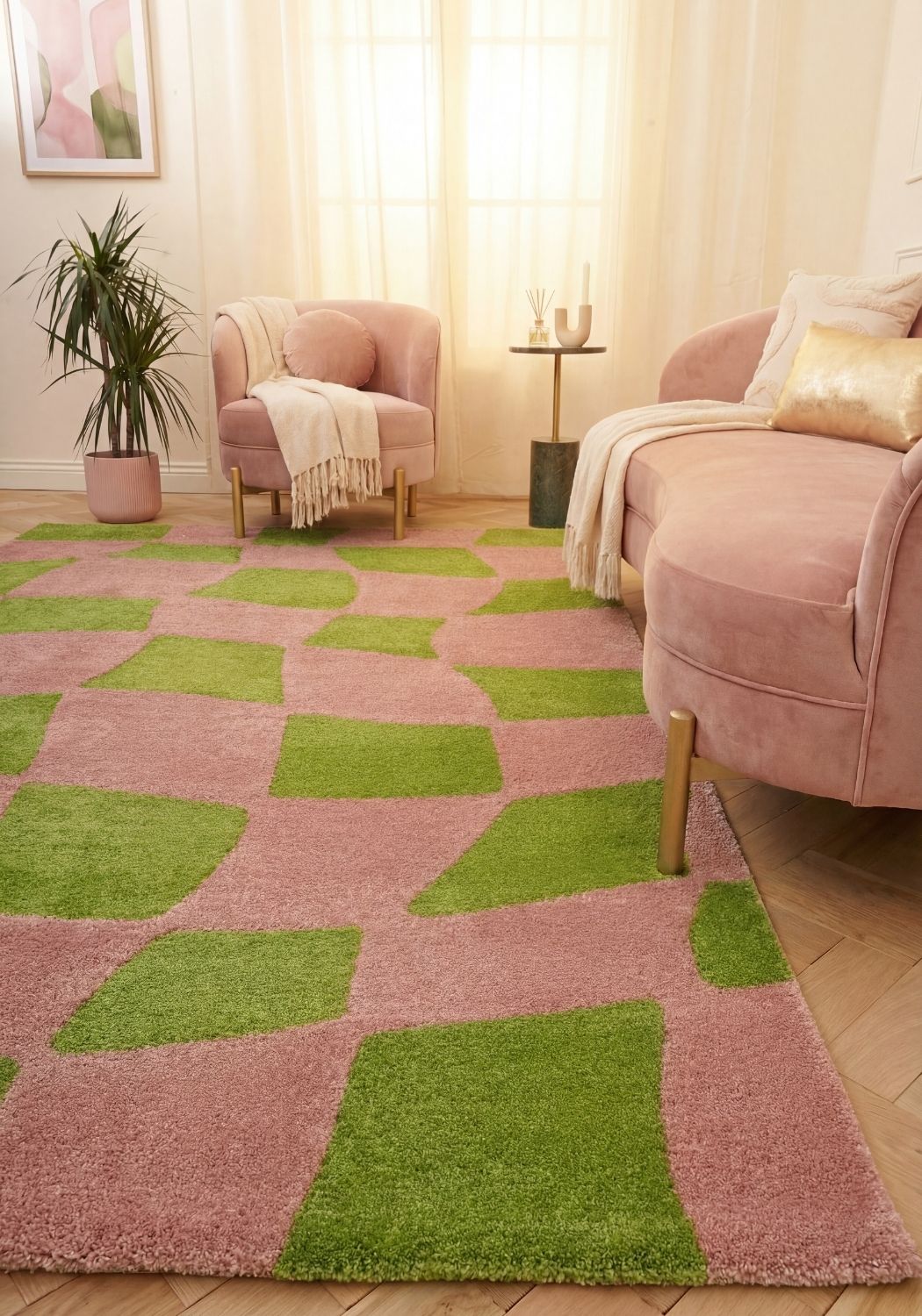 Living room with pink and green checkered rug, pink armchair, and beige sofa.