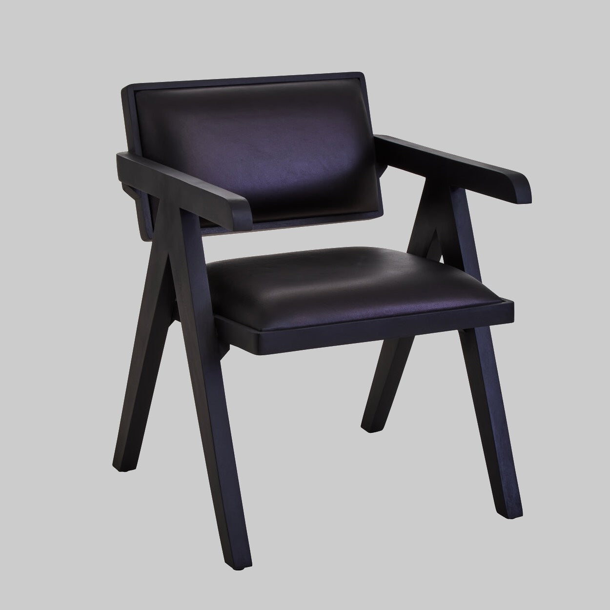 Black chair with leather seat and backrest on a gray background
