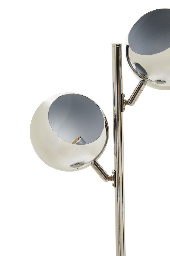Floor lamp with two spherical shades on a white background