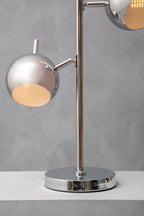 Modern table lamp with two adjustable lights on a gray background