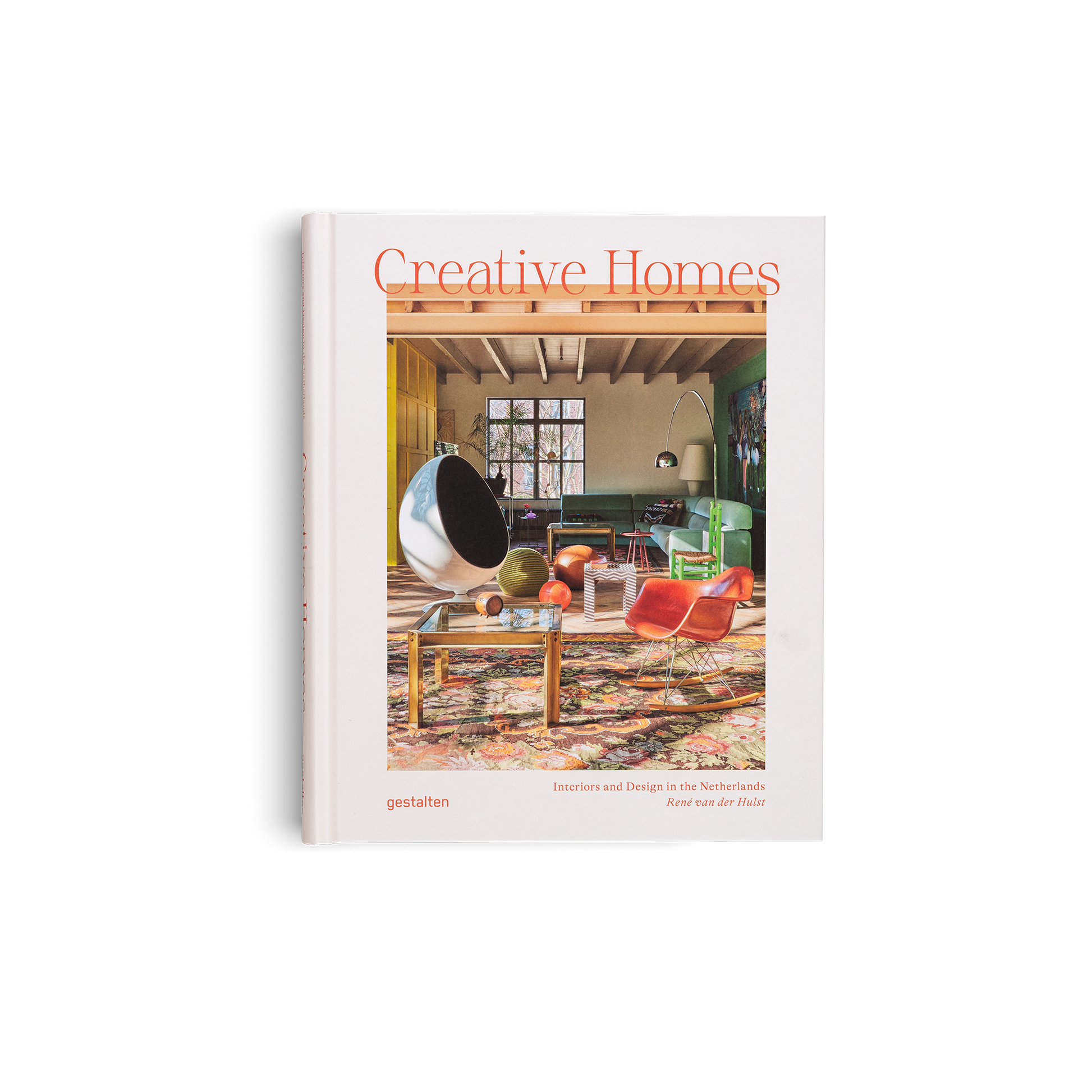 Book titled 'Creative Homes' with an interior design image on the cover.