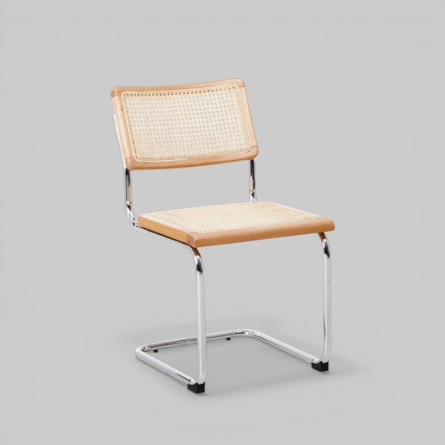 DESSAU Bauhaus-inspired rattan and tubular steel cantilever dining chair KEFINO