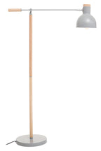 Floor lamp with grey shade and wooden pole on a white background
