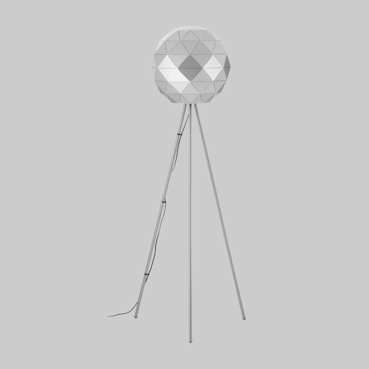 Geometric floor lamp with a silver metallic finish on a gray background