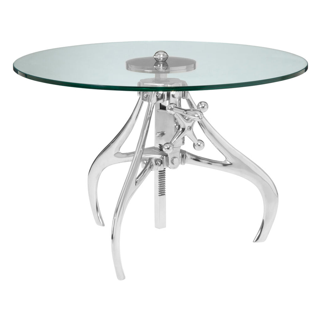 Glass top table with chrome metal base on a white background