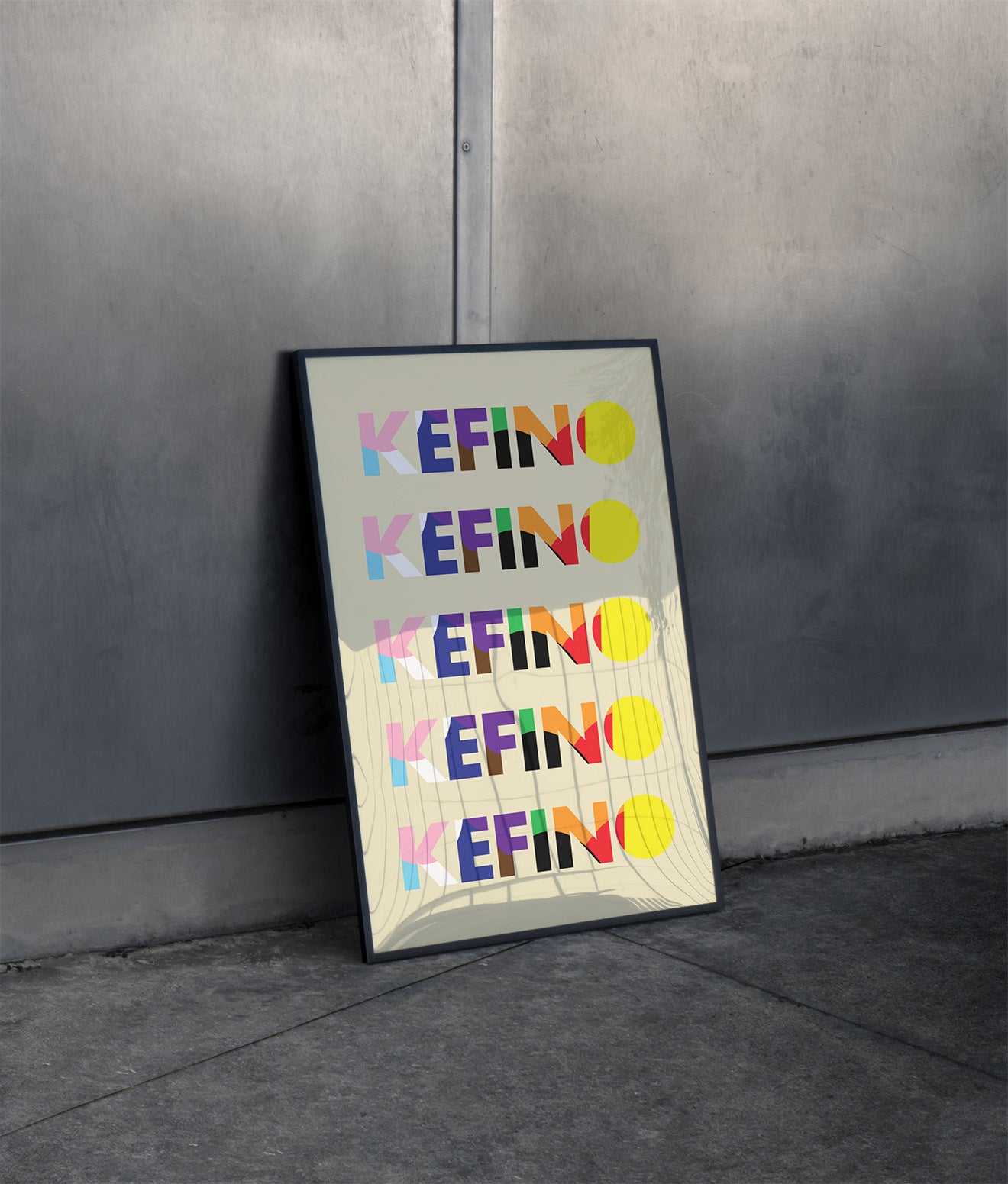 KEFINO Logo Poster in Black Frame leaning on wall