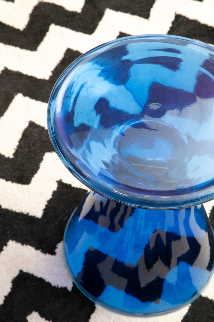 Blue Glass Martini Side Table on geometric rug
