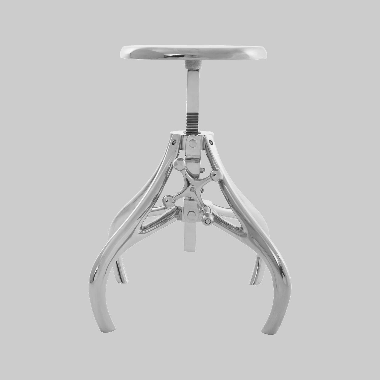 Metallic stool with adjustable legs on a gray background