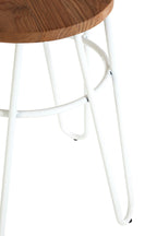 Bar stool with wooden seat and white metal legs on a white background