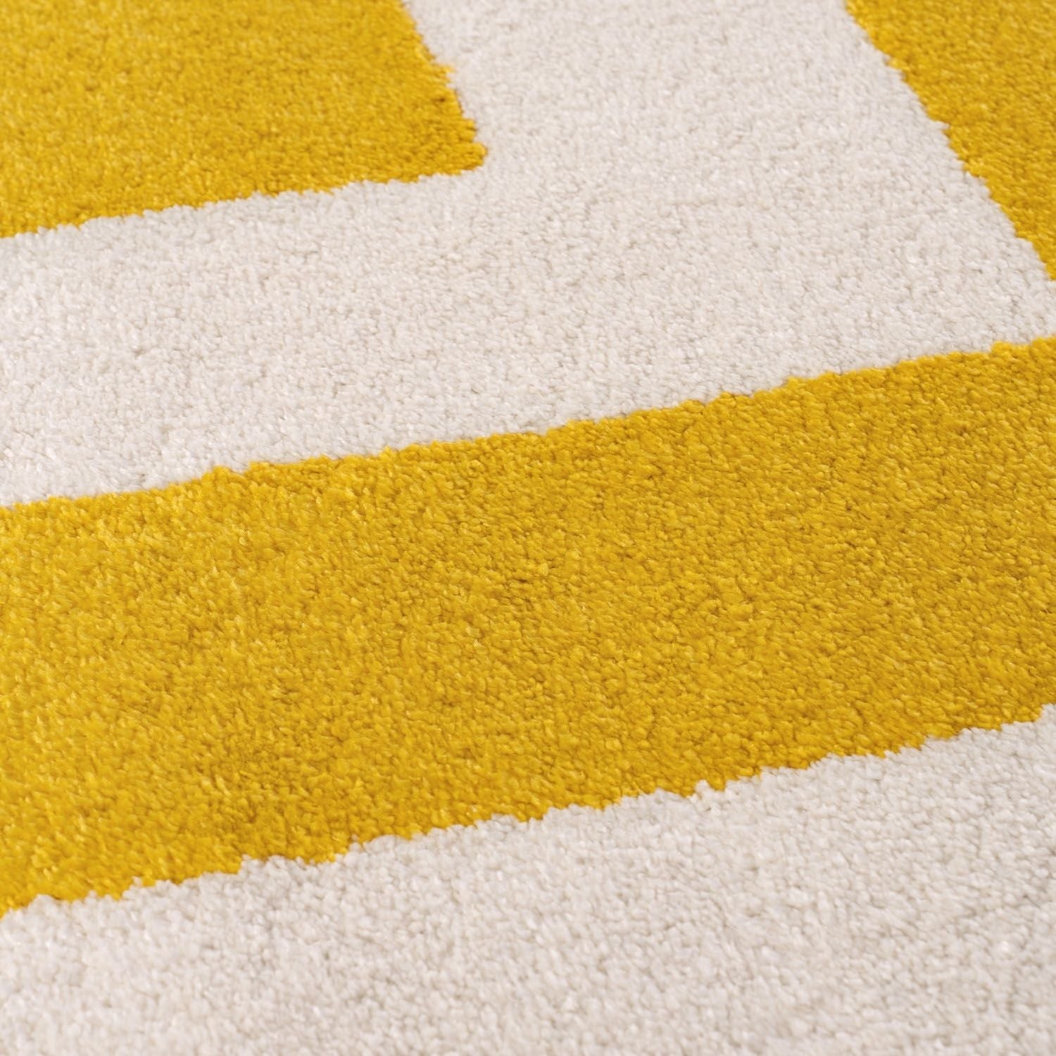 Close-up of a yellow and white striped rug