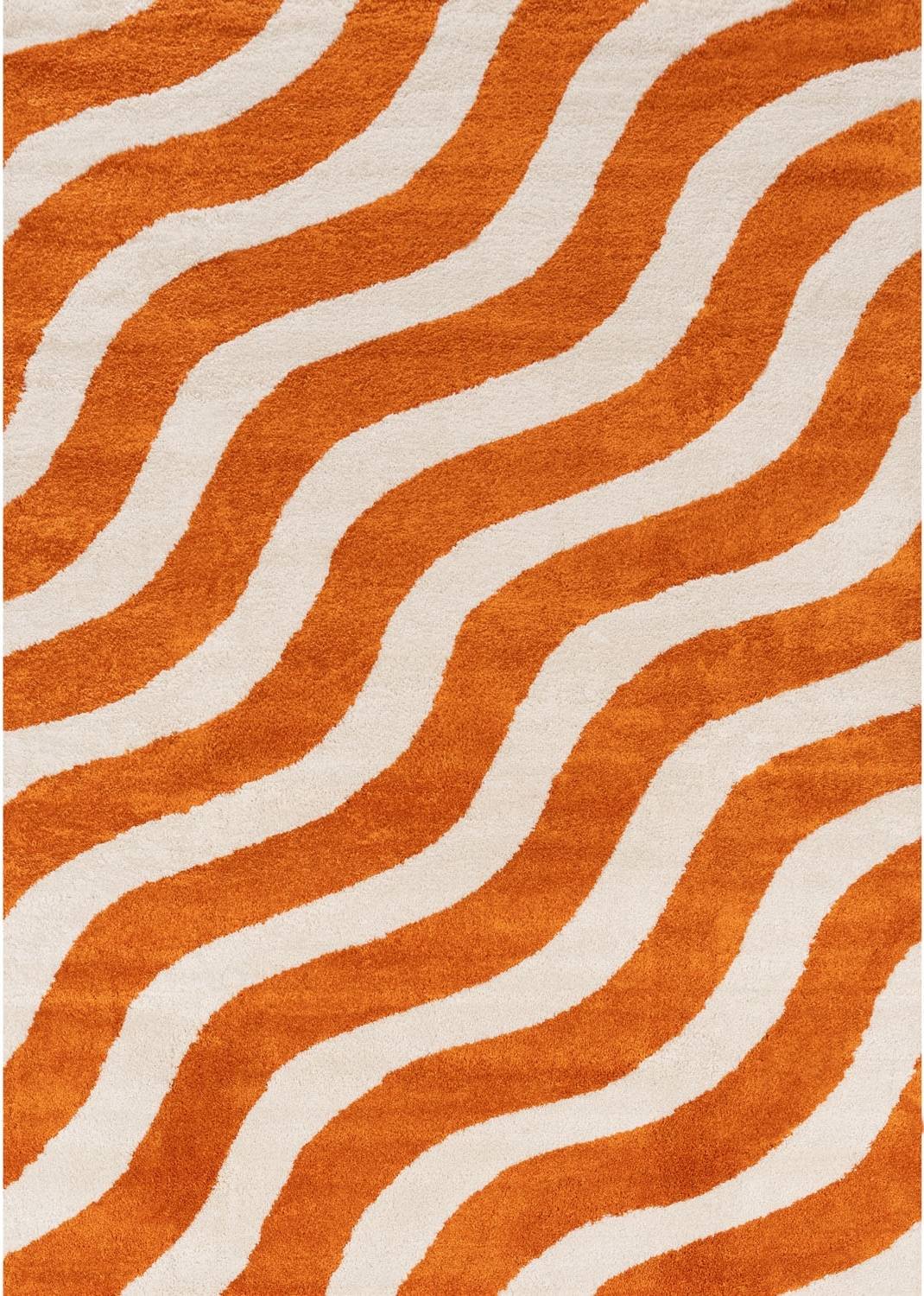 Rug with orange and white wavy pattern