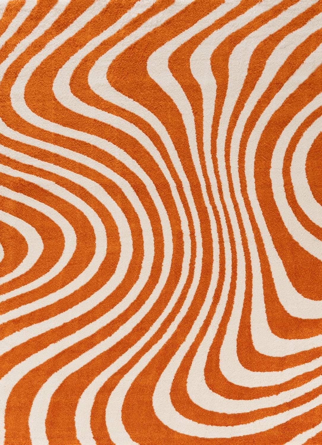 Patterned rug with orange and white wavy lines