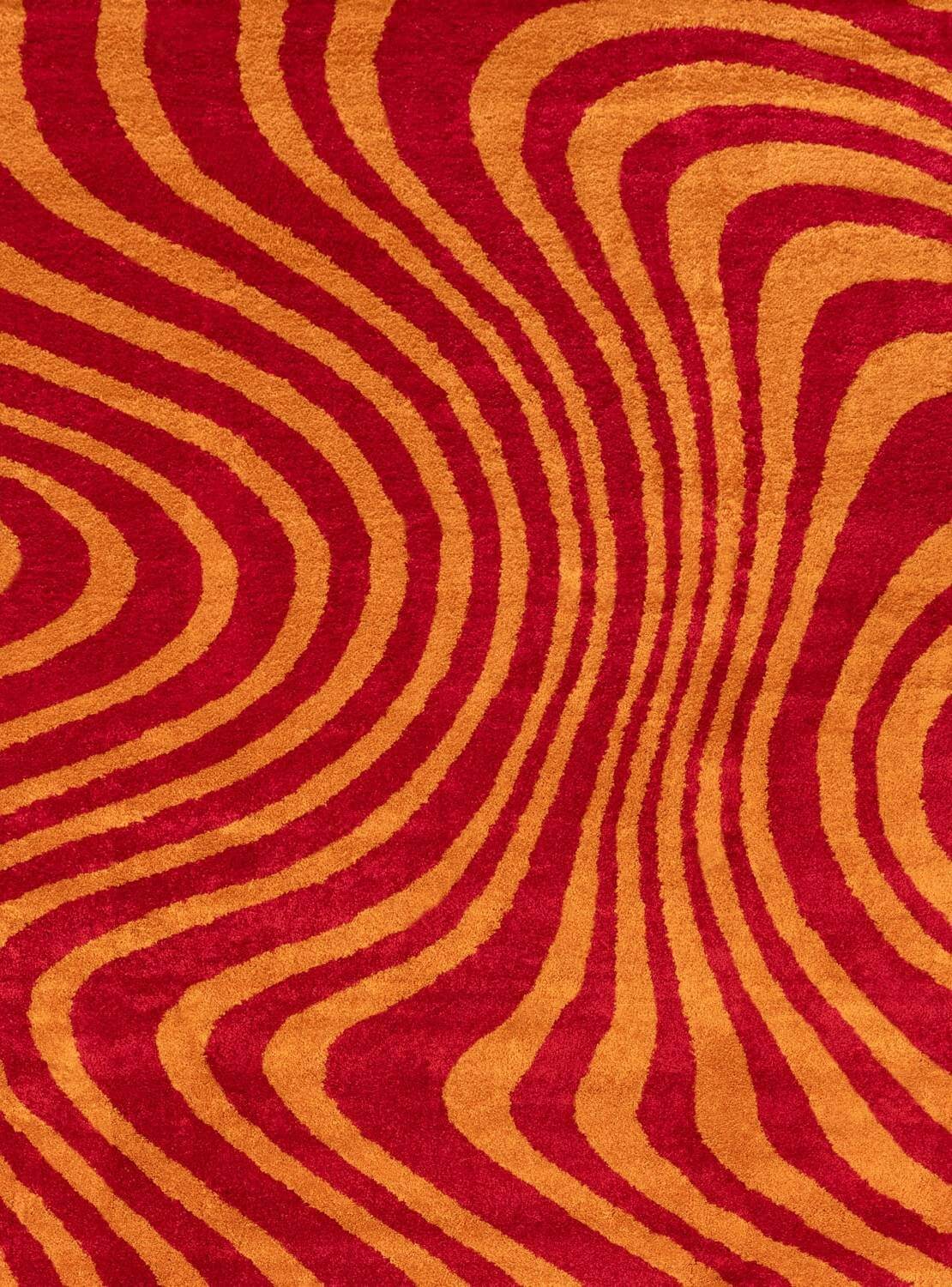 Red and orange wavy patterned rug