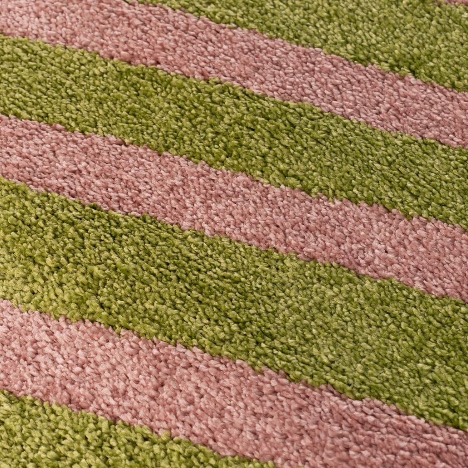 Close-up of striped green and pink carpet