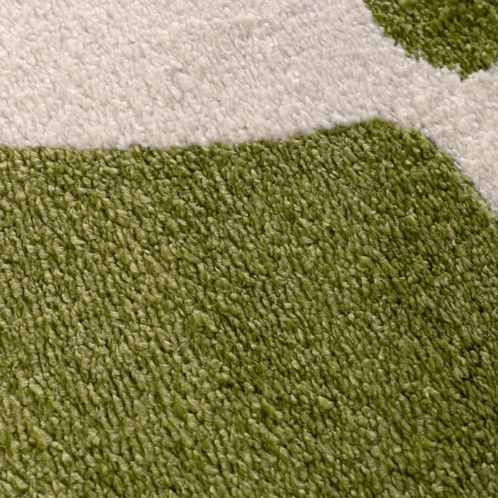 Close-up of green and white carpet texture