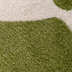 Close-up of green and white carpet texture