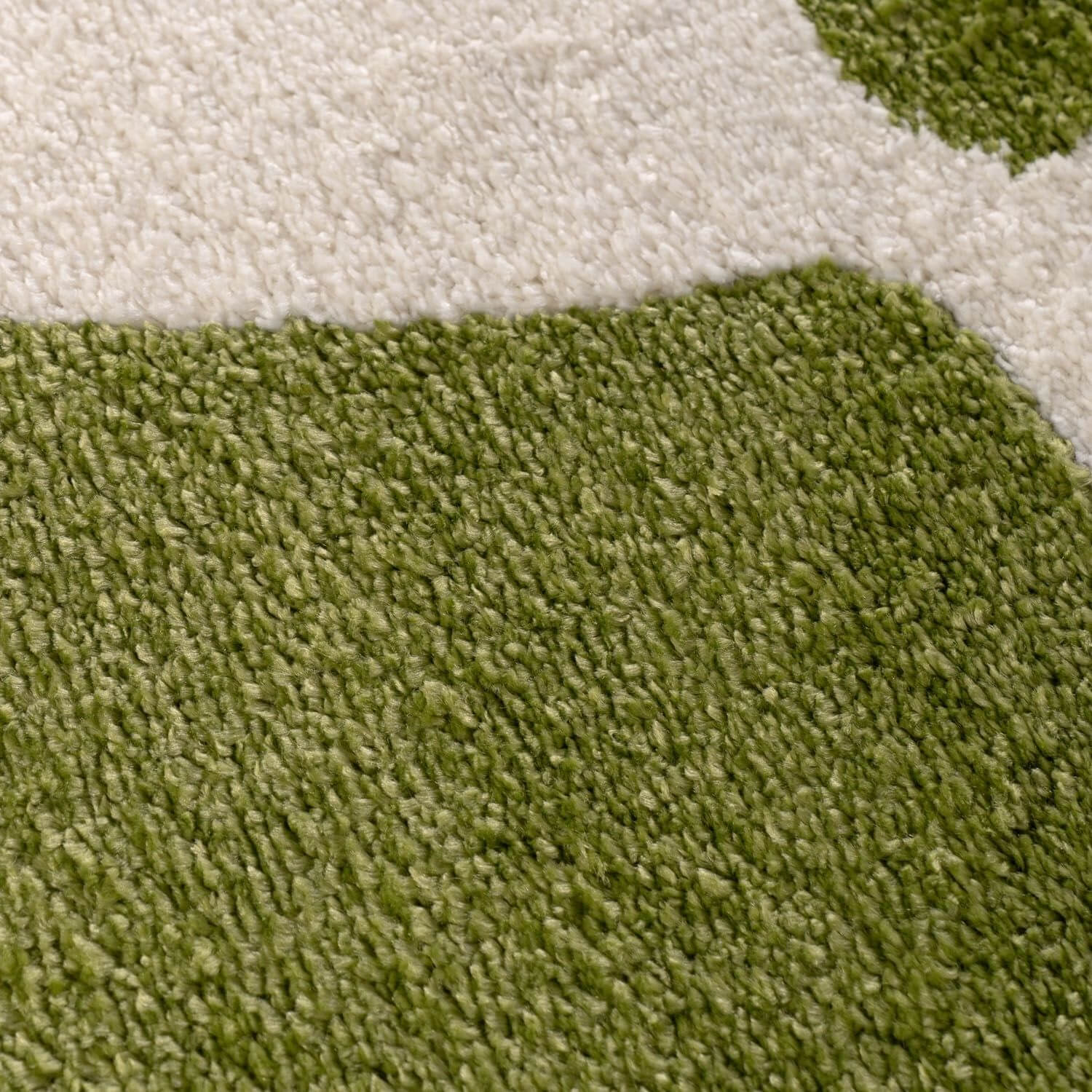 Close-up of green and white carpet texture